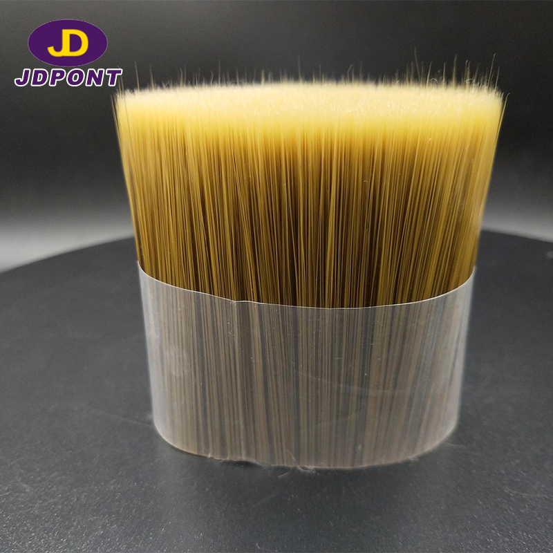 Solid mixture synthetic brush filament f...